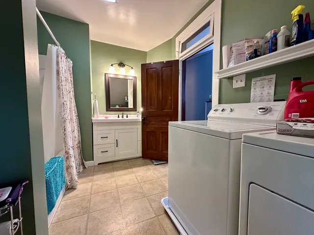 a utility room with dryer and washer