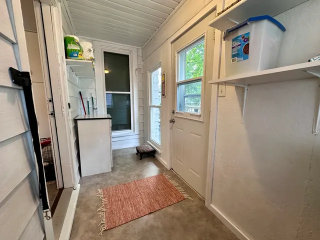 a view of an entryway with a window