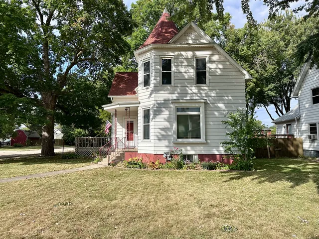 a front view of house with play ground