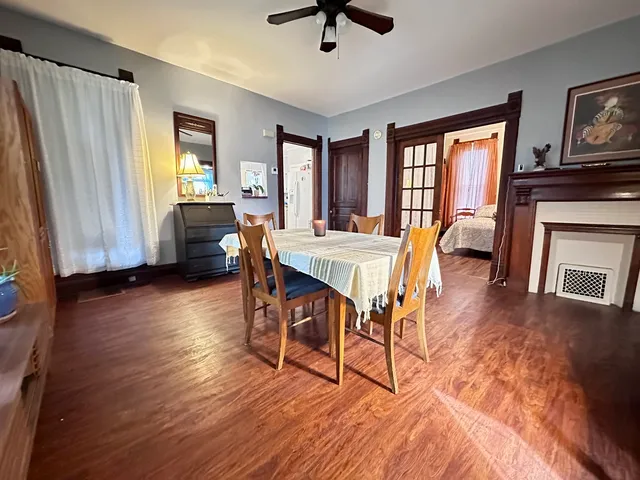 a view of a livingroom with furniture window and wooden floor