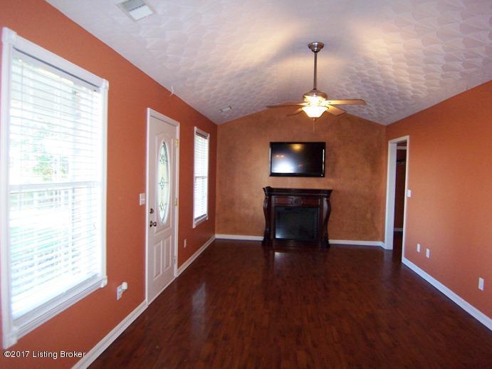 2833 Roberts Road Bardstown, KY 40004 - Photo 2 of 26 Vaulted Living Room with dark laminate wood flooring.