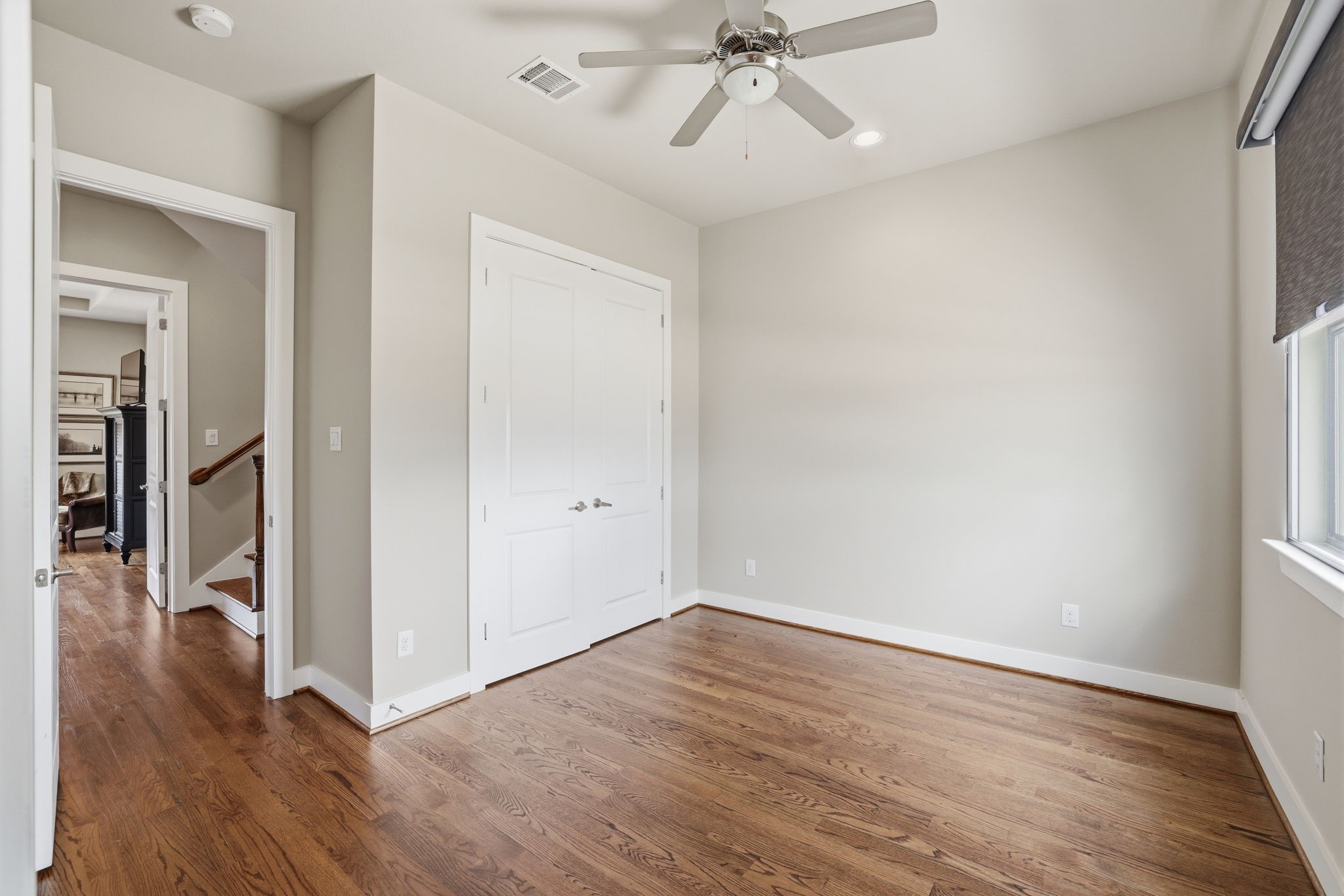 4102 Marina Street Houston, TX 77007 - Photo 23 of 32 Spacious secondary bedrooms offer flexibility for guests, a gym, or a creative studio, all finished with the same attention to detail found throughout the home.