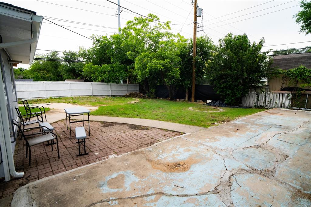 2136 Ridgeway Street Arlington, TX 76010 - Photo 25 of 32 a view of a swimming pool with a patio