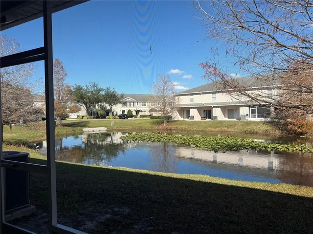 a view of a lake from a balcony