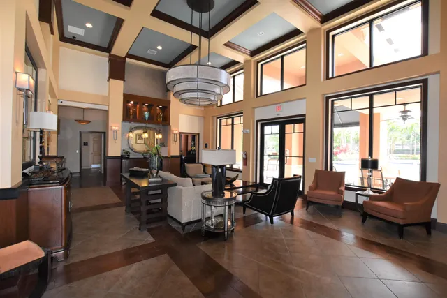 a view of a livingroom with furniture and window