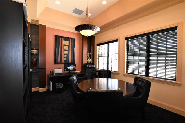a kitchen with a sink and wooden cabinets