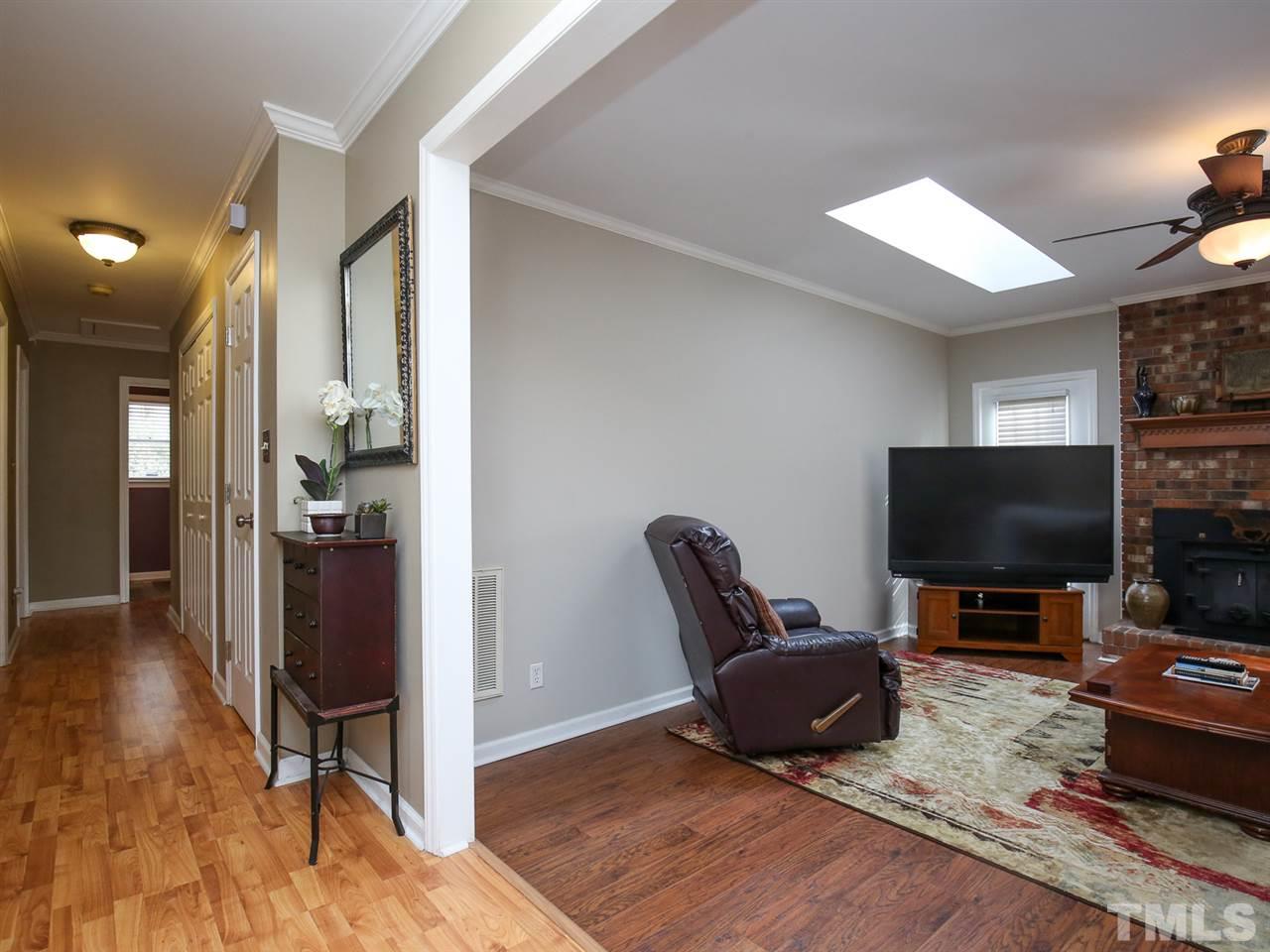 1811 Southview Road Durham, NC 27703 - Photo 3 of 30 a living room with furniture and a flat screen tv