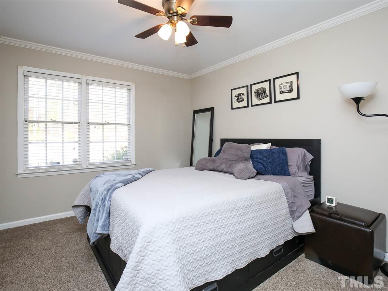 1811 Southview Road Durham, NC 27703 - Photo 23 of 30 a bedroom with bed and window