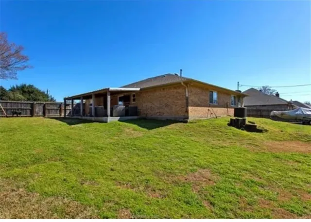a view of a house with a big yard