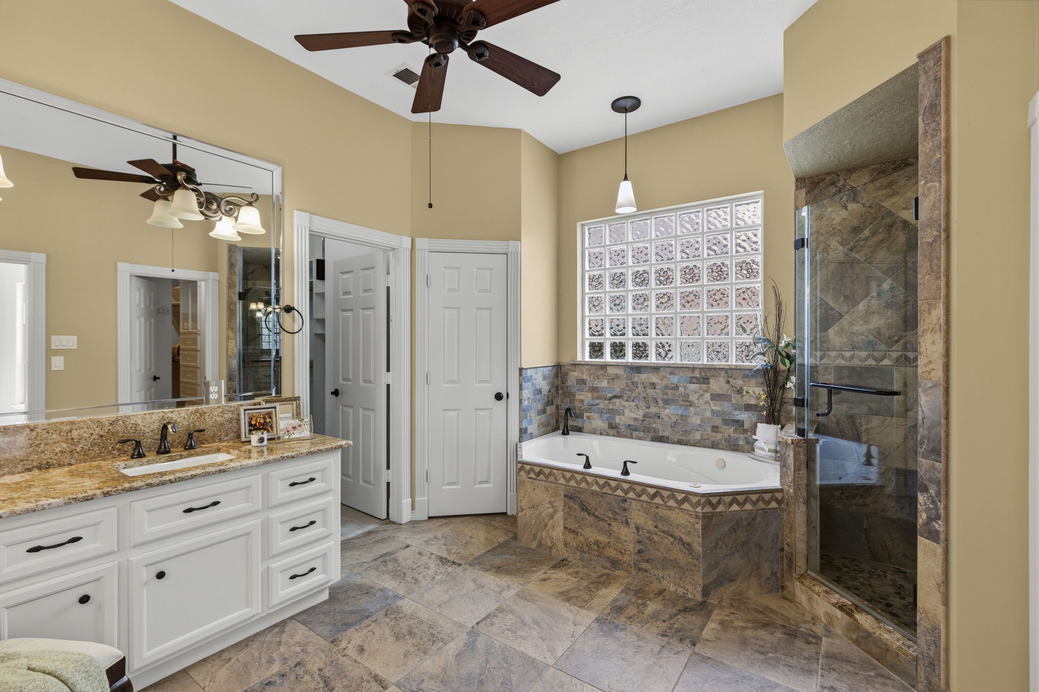 18310 Pamela Way Spring, TX 77379 - Photo 24 of 42 Dual vanities with expansive granite countertops and under-mount sinks.