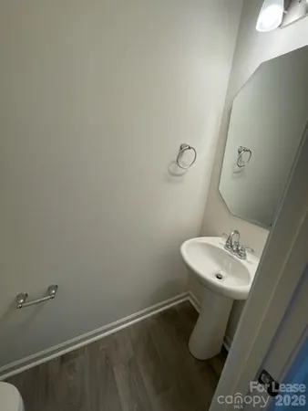 a bathroom with a sink and mirror