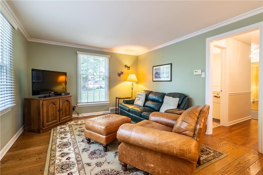 525 Trotwood Ridge Road Pittsburgh, PA 15241 - Photo 6 of 15 To the right is the hallway to powder room and front door.