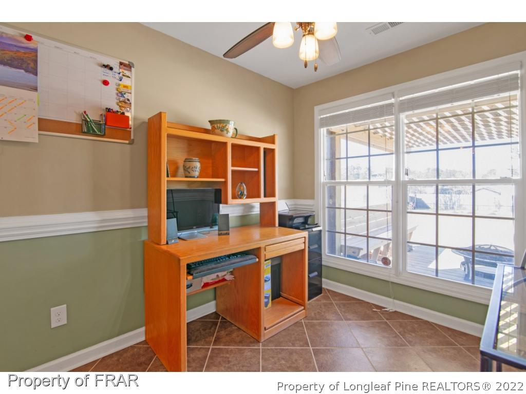 361 Camden Road Raeford, NC 28376 - Photo 16 of 36 a room with furniture and a window
