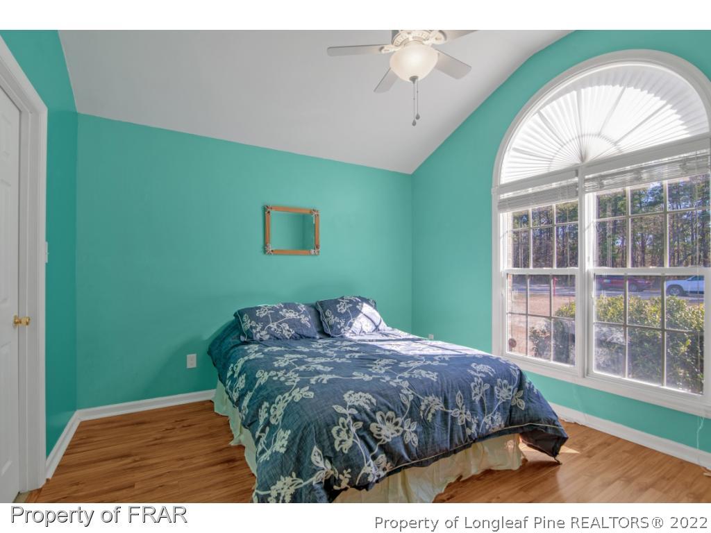 361 Camden Road Raeford, NC 28376 - Photo 23 of 36 a bedroom with a bed and a window