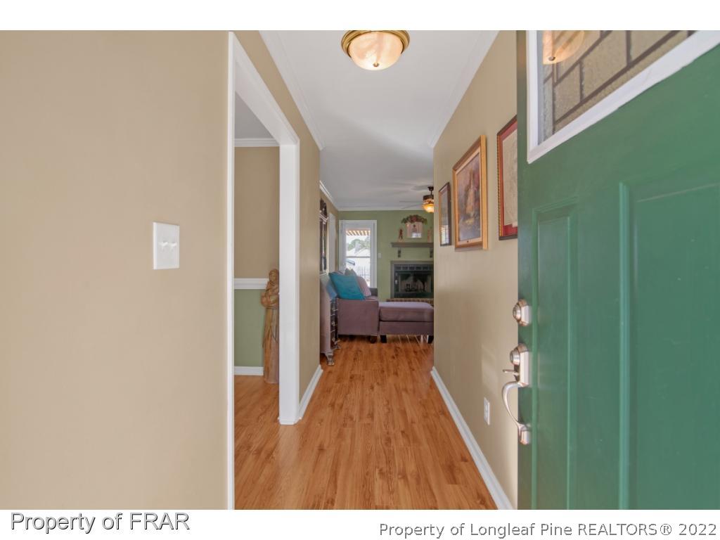 361 Camden Road Raeford, NC 28376 - Photo 4 of 36 a view of a hallway with a dining room