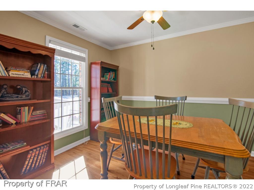 361 Camden Road Raeford, NC 28376 - Photo 5 of 36 a view of a dining room with furniture and a window