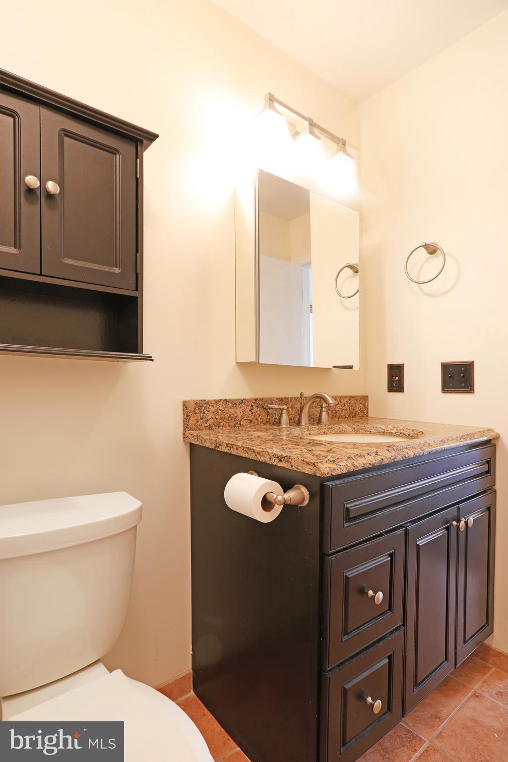 19 Chelsea Court Sewell, NJ 08080 - Photo 15 of 19 a bathroom with a granite countertop toilet sink and mirror