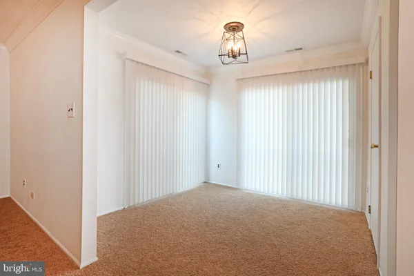 a view of empty room with a window
