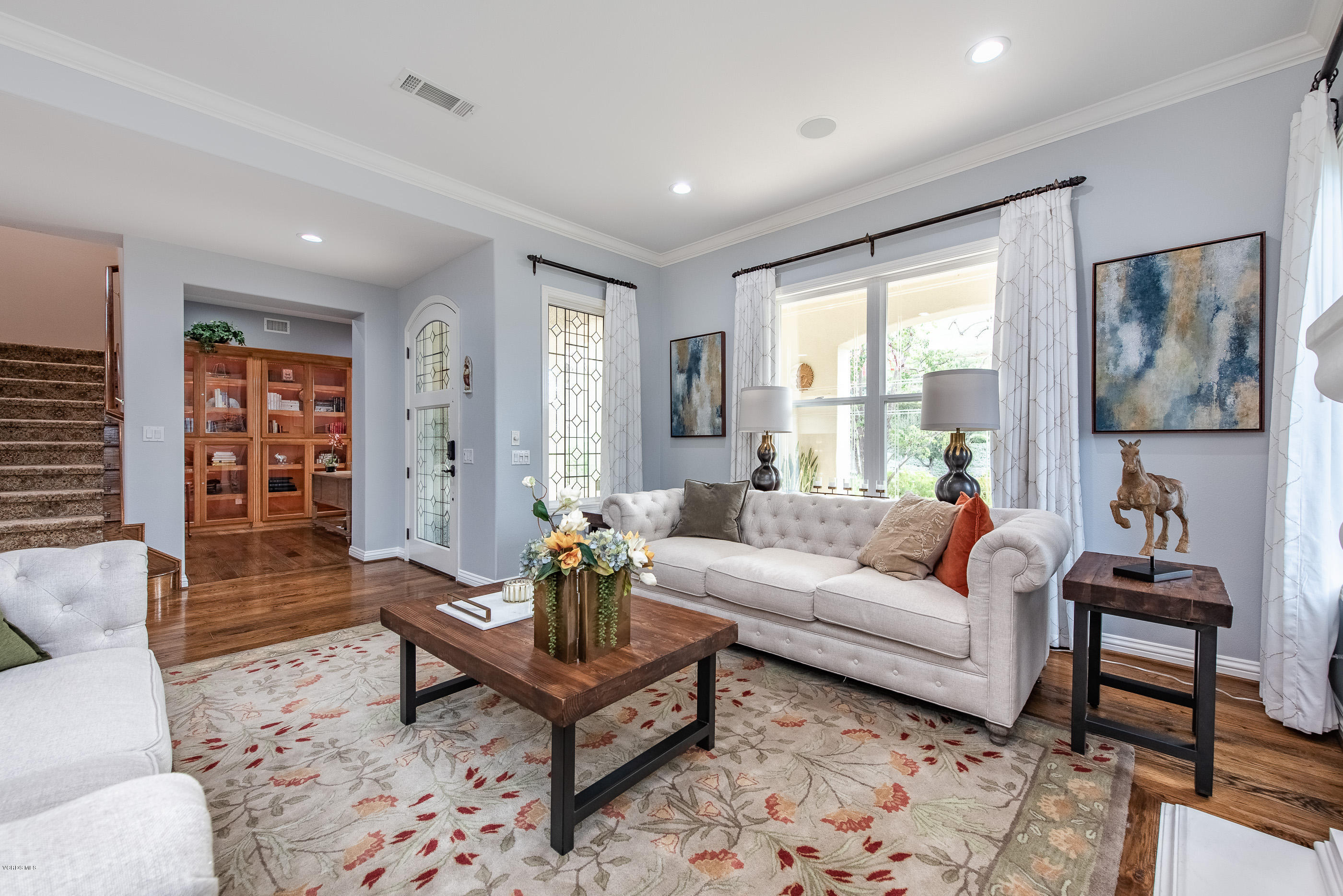 5635 Evening Sky Drive Simi Valley, CA 93063 - Photo 15 of 84 a living room with furniture and wooden floor
