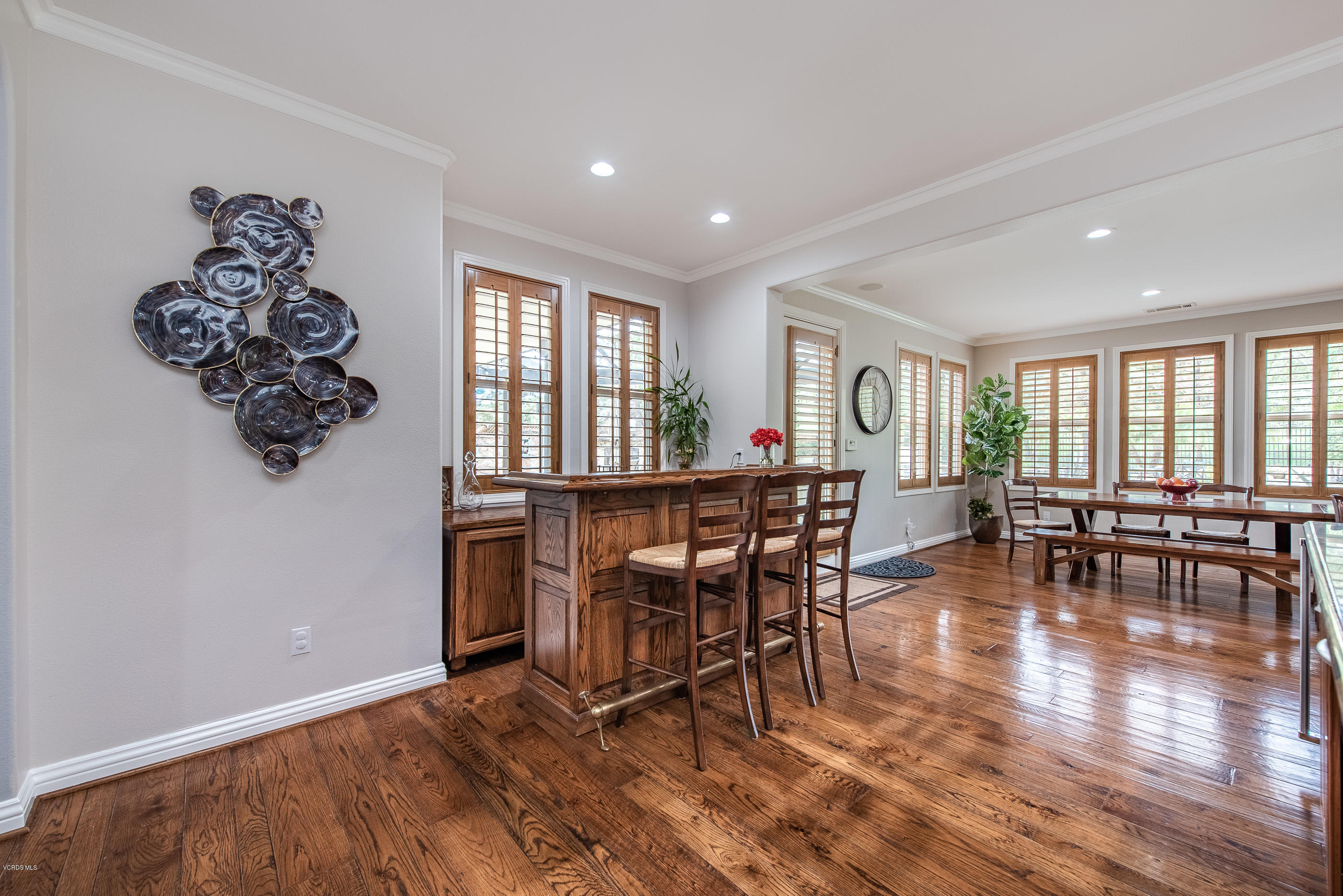 5635 Evening Sky Drive Simi Valley, CA 93063 - Photo 29 of 84 a view of a dining room with furniture window and wooden floor