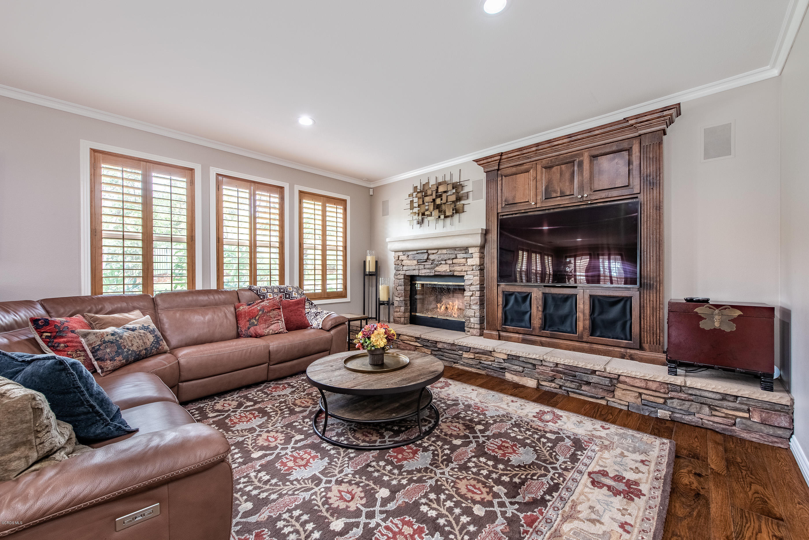 5635 Evening Sky Drive Simi Valley, CA 93063 - Photo 31 of 84 a living room with furniture and a fireplace