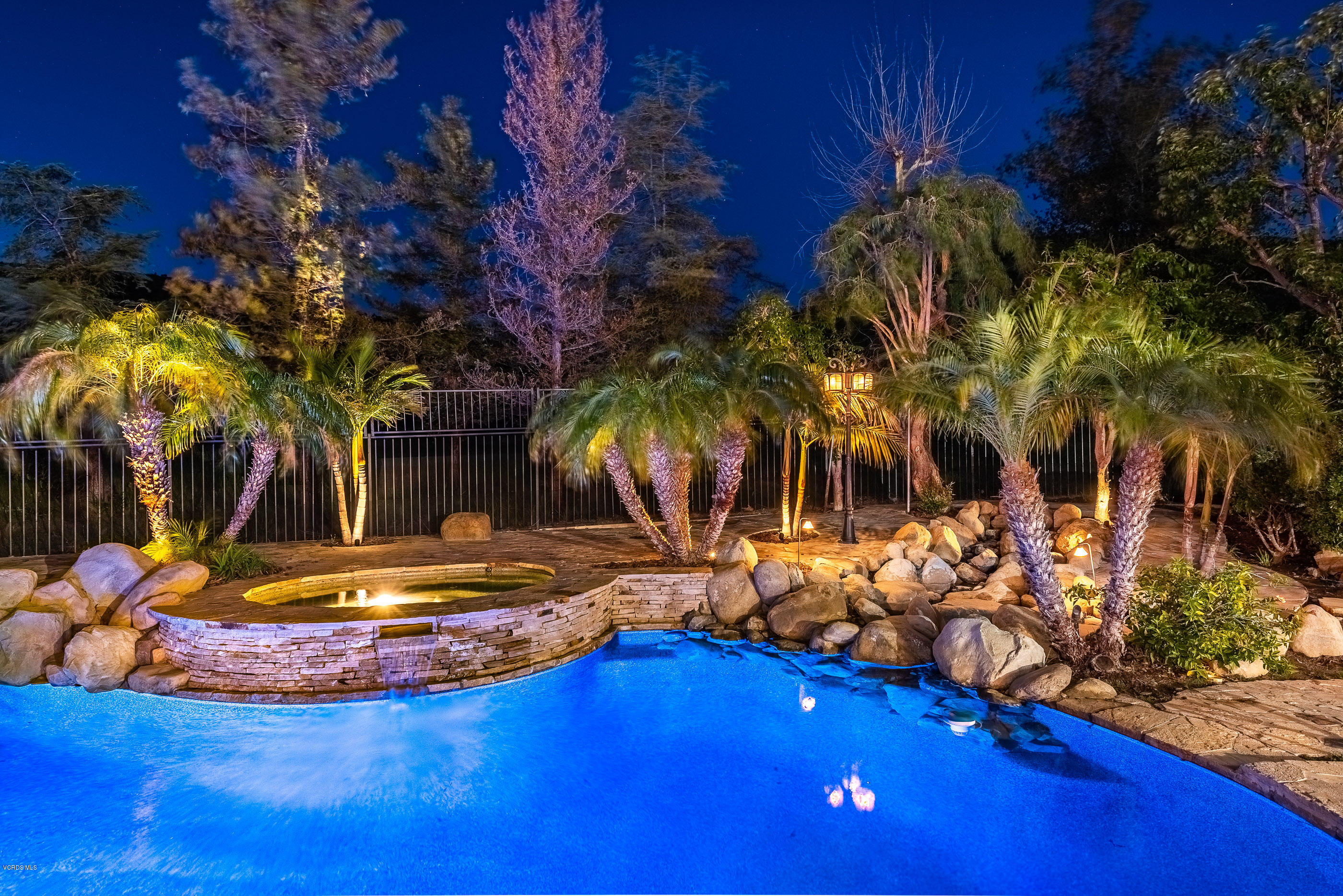 5635 Evening Sky Drive Simi Valley, CA 93063 - Photo 5 of 84 a view of a swimming pool with an outdoor space and seating area