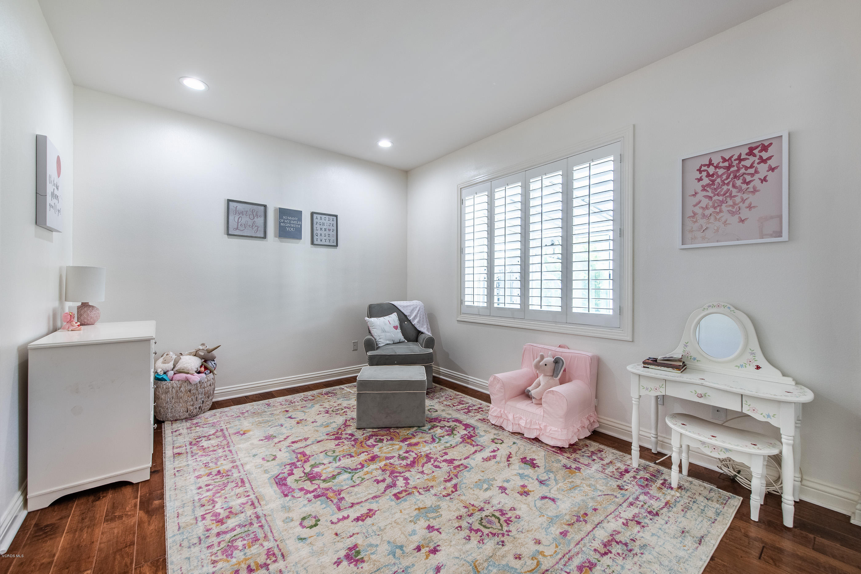 5635 Evening Sky Drive Simi Valley, CA 93063 - Photo 50 of 84 a bedroom with a bed and wooden floor