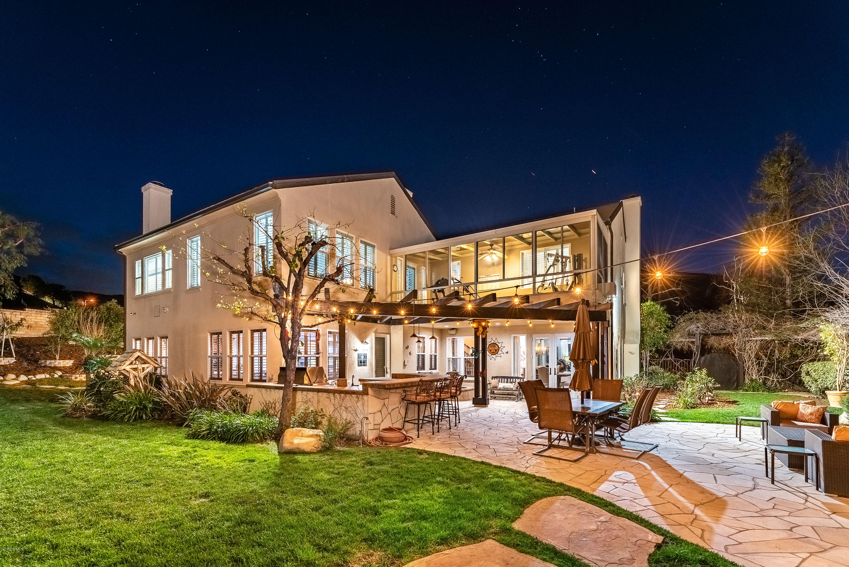 5635 Evening Sky Drive Simi Valley, CA 93063 - Photo 6 of 84 a view of a chairs and tables in the patio