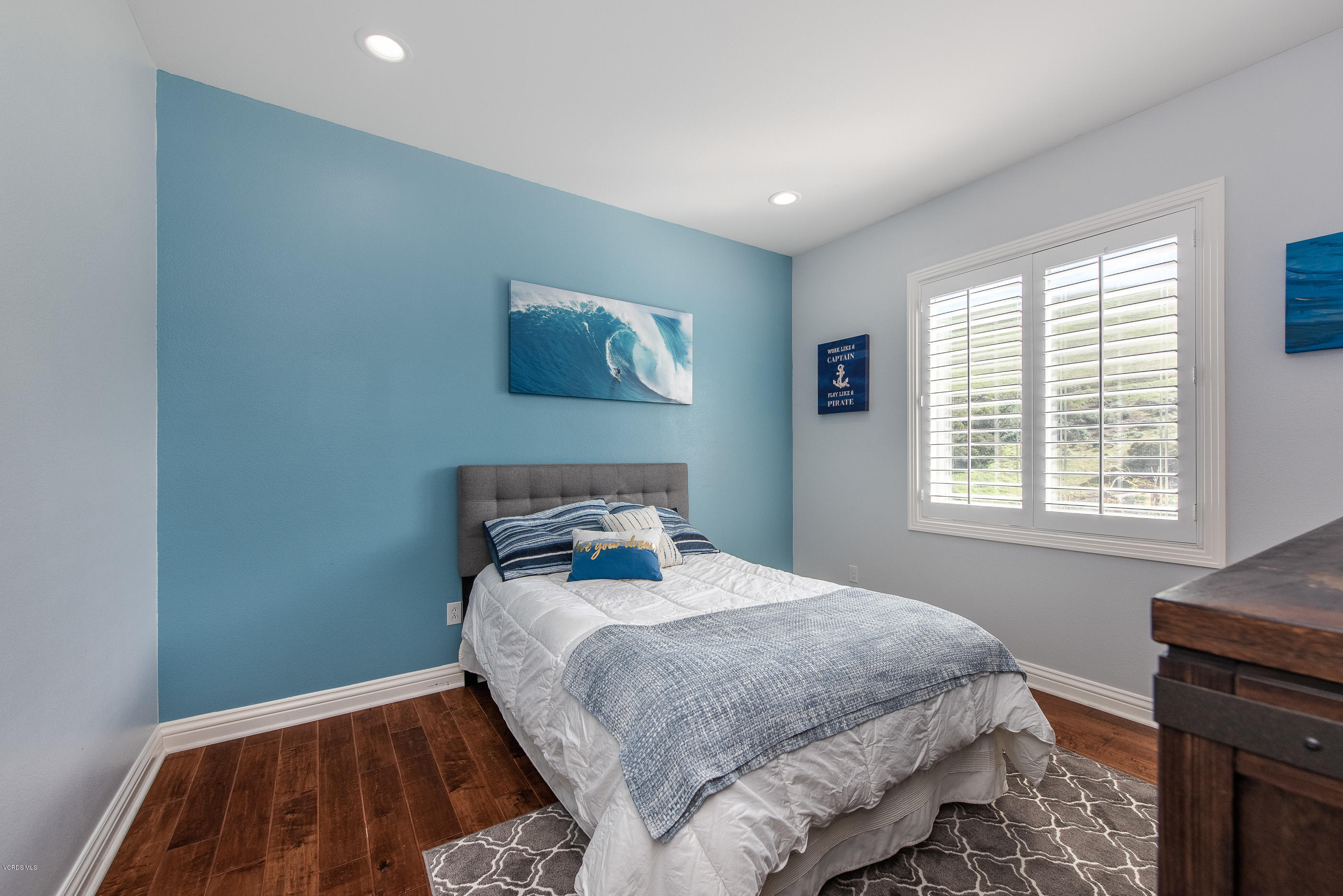 5635 Evening Sky Drive Simi Valley, CA 93063 - Photo 57 of 84 a bedroom with a bed and a window