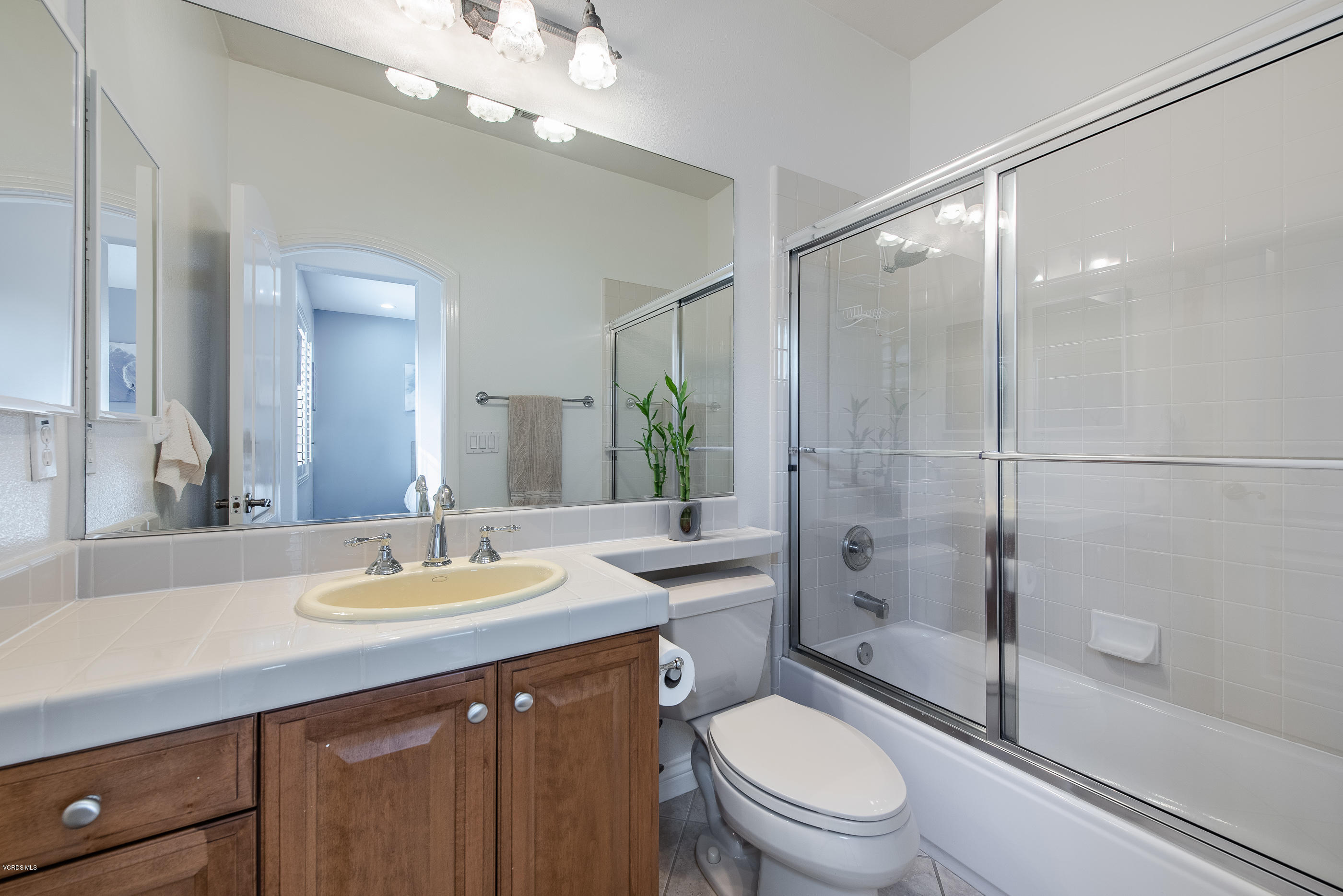 5635 Evening Sky Drive Simi Valley, CA 93063 - Photo 59 of 84 a bathroom with a sink a toilet and shower