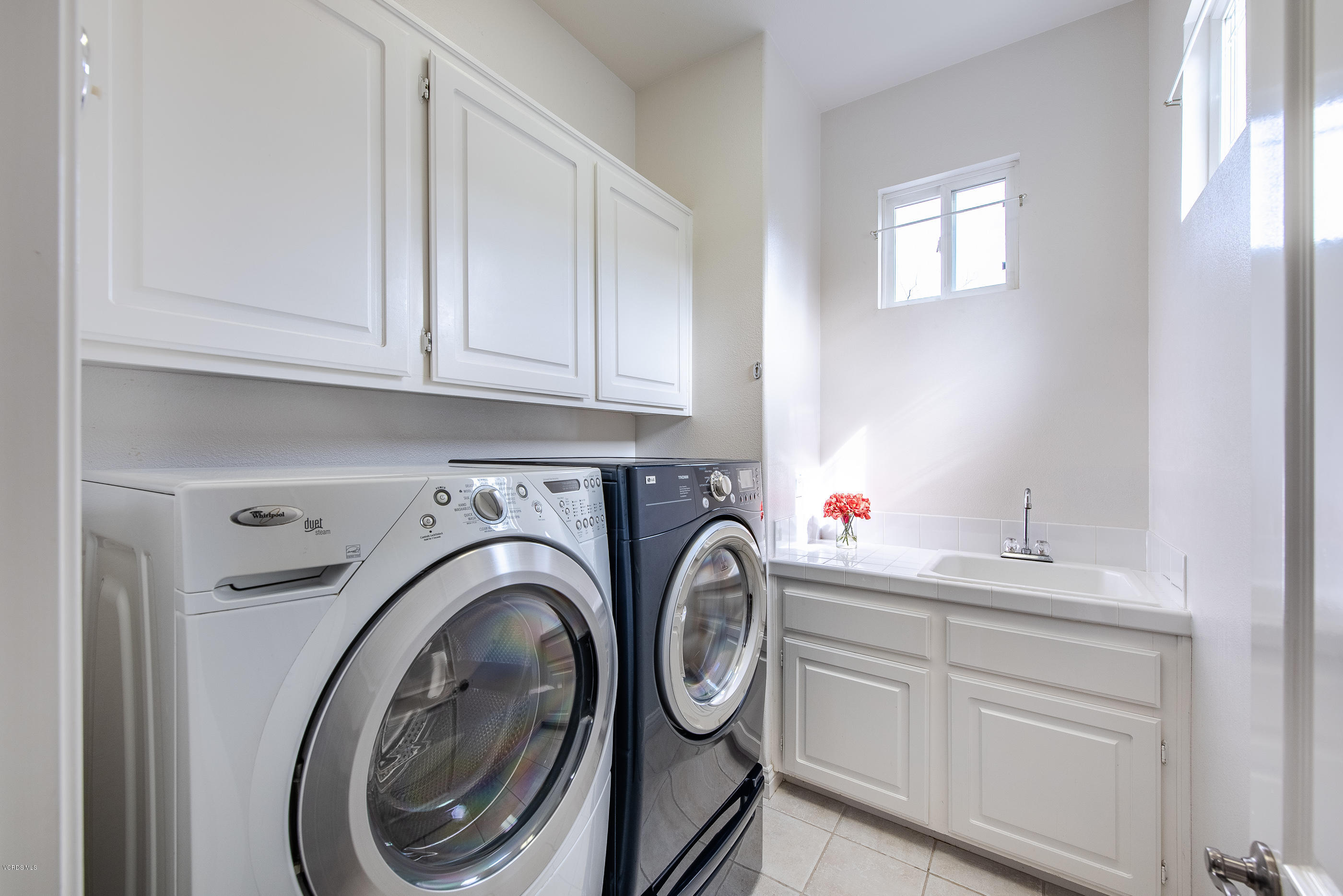 5635 Evening Sky Drive Simi Valley, CA 93063 - Photo 61 of 84 a utility room with sink dryer and washer