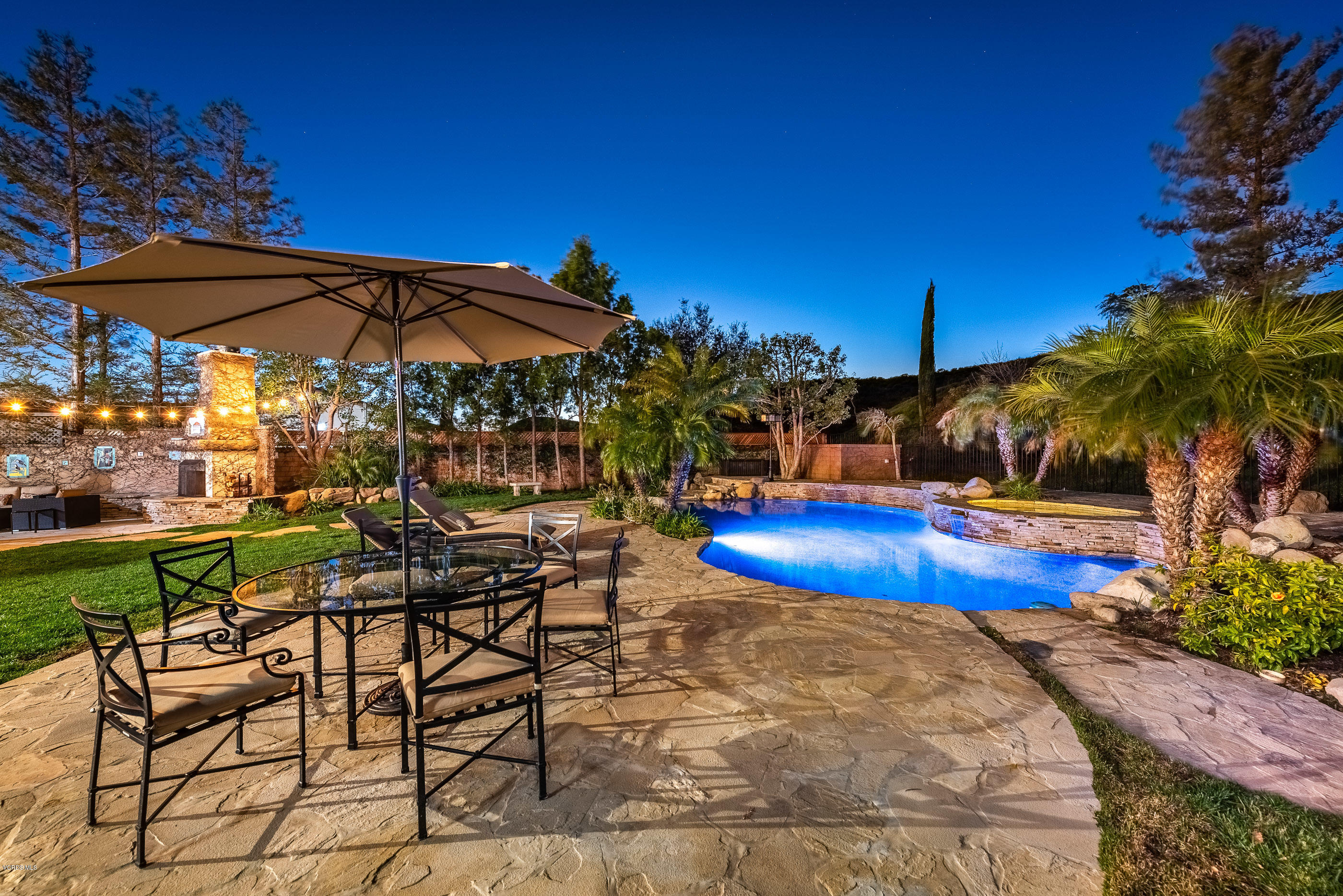 5635 Evening Sky Drive Simi Valley, CA 93063 - Photo 80 of 84 a view of a chairs and table in the patio