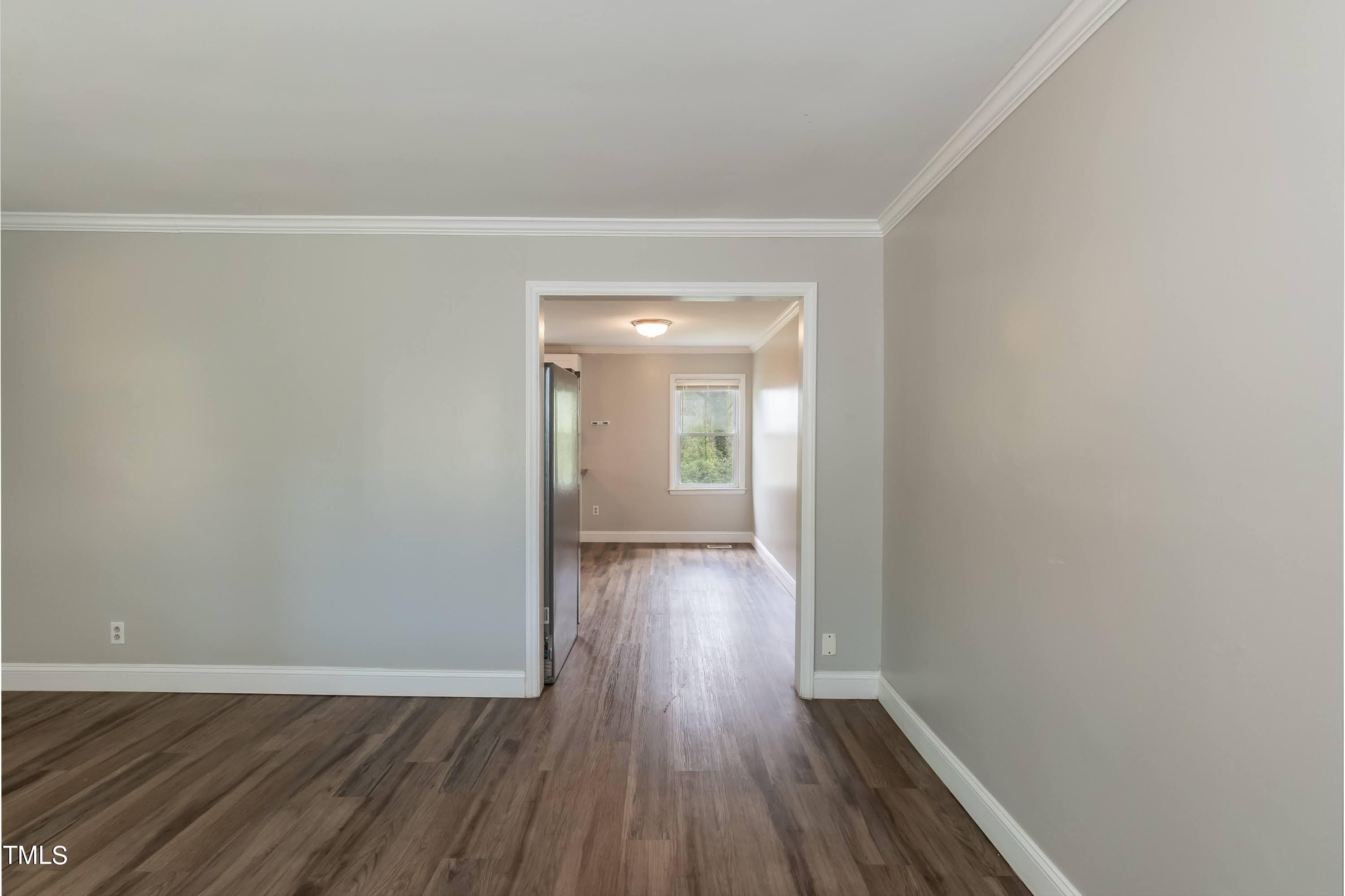 2019 Highway 55 Durham, NC 27707 - Photo 10 of 34 a view of a hallway with wooden floor