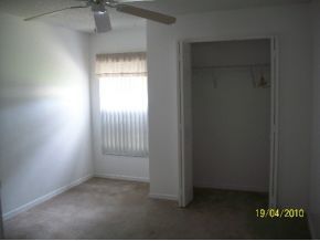 1320 Southeast Ran Palm Bay, FL 32909 - Photo 8 of 8 an empty room with a window
