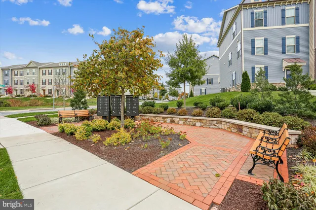 a childrens park with lots of swings and slides
