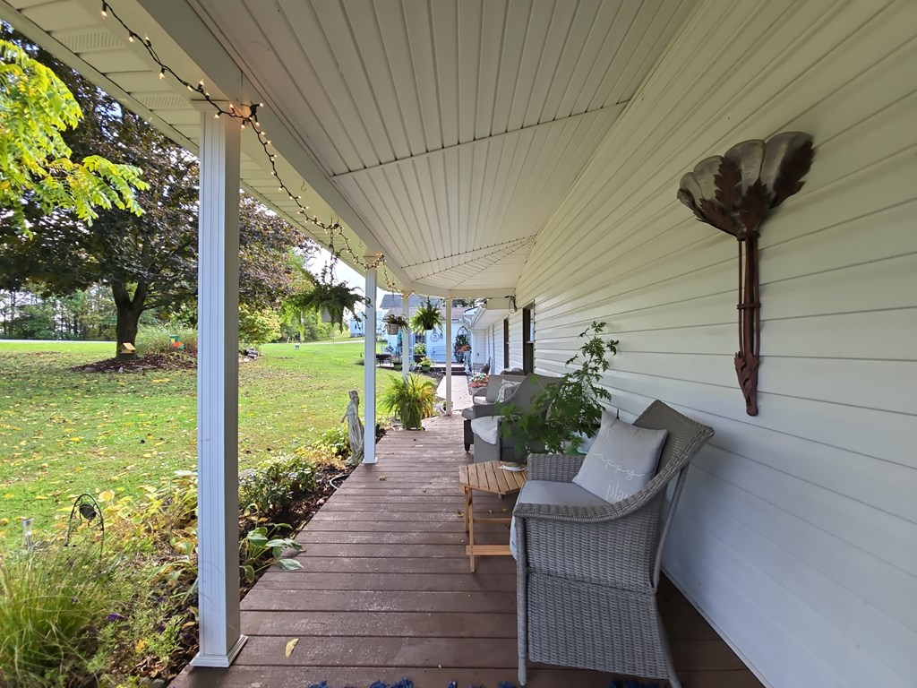 1405 Madison Road Templeton, PA 16259 - Photo 44 of 50 a view of a porch with furniture and garden