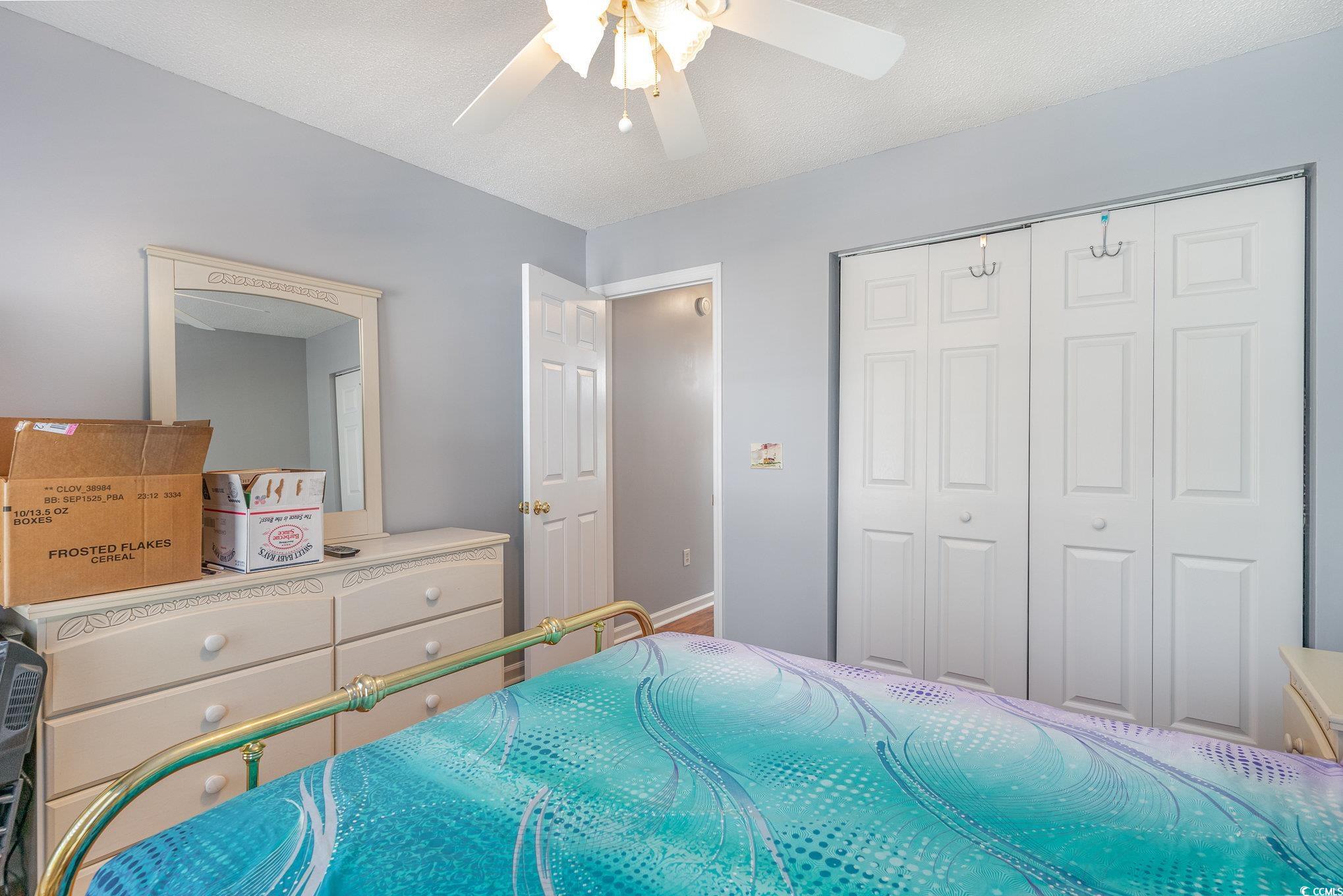 354 Deer Run Avenue Georgetown, SC 29440 - Photo 16 of 32 Bedroom with a closet and a ceiling fan