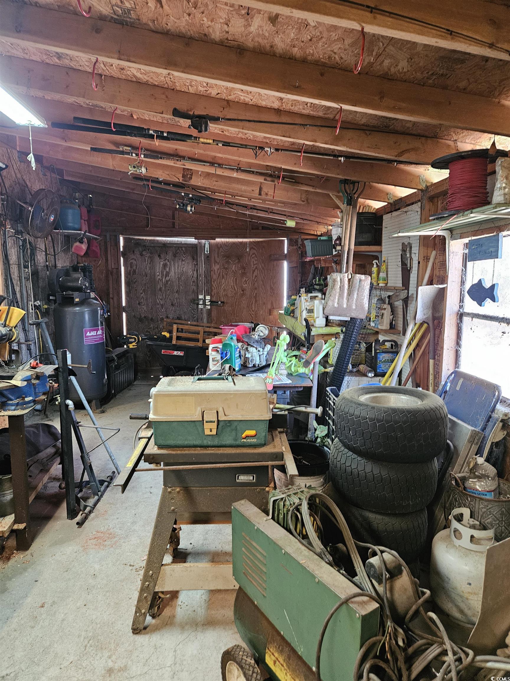 354 Deer Run Avenue Georgetown, SC 29440 - Photo 29 of 32 Garage with a workshop area
