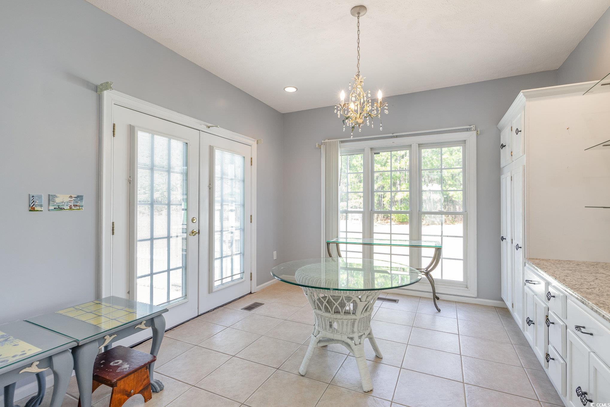 354 Deer Run Avenue Georgetown, SC 29440 - Photo 9 of 32 Area featuring french doors, visible vents, basebo