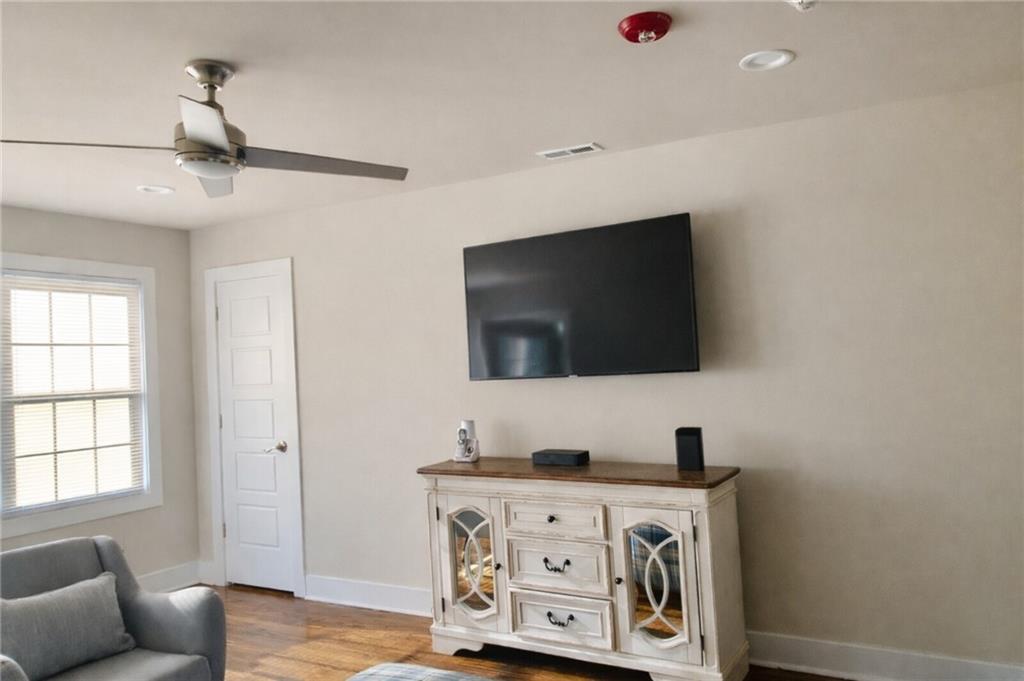 2130 Seavey Drive Decatur, GA 30032 - Photo 5 of 16 a living room with furniture and a flat screen tv