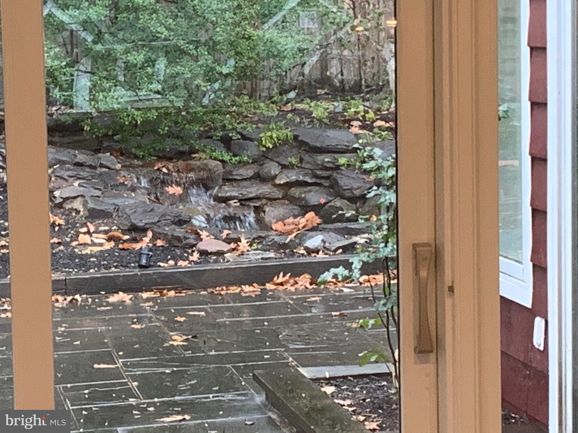6313 Valley Road Bethesda, MD 20817 - Photo 9 of 21 Calm Waterfall and Pond
