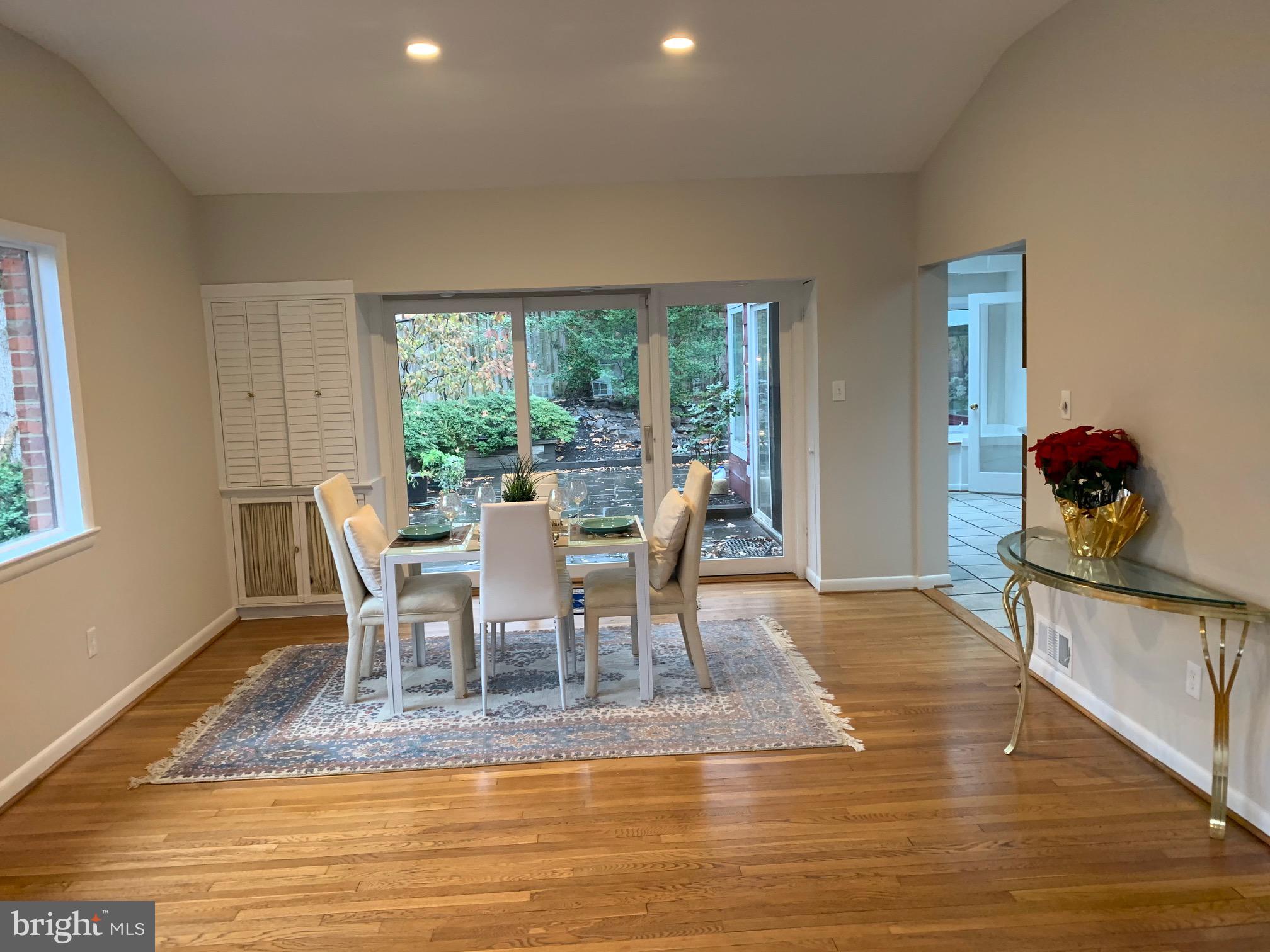 6313 Valley Road Bethesda, MD 20817 - Photo 10 of 21 Dining Room with access to patio and waterfall