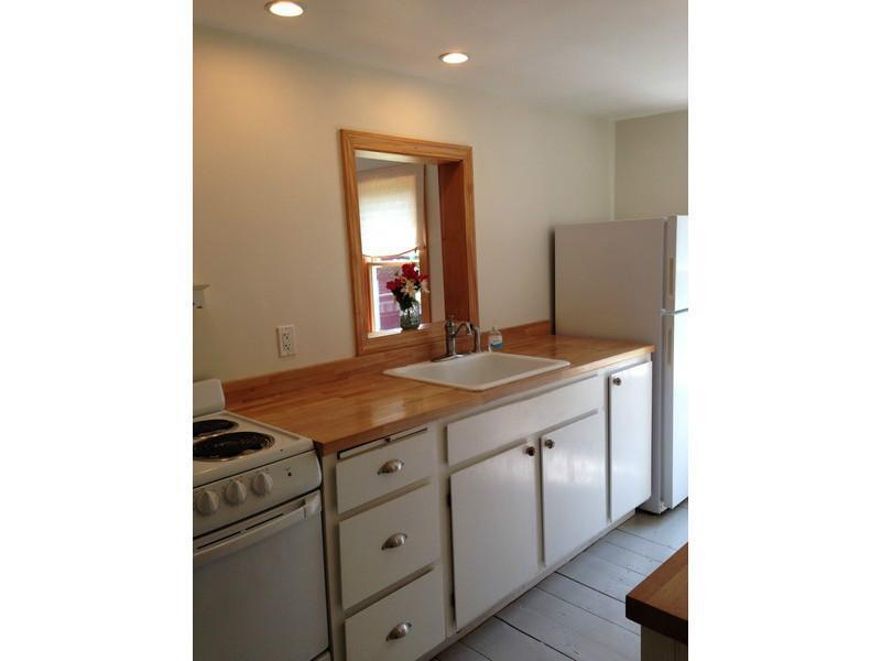 20 Hammond Road Damariscotta, ME 04543 - Photo 21 of 25 Kitchen. A little window affords the...