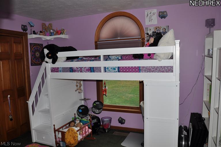 3456 Porter Road Rootstown, OH 44272 - Photo 23 of 25 Secondary bedroom with double closets.