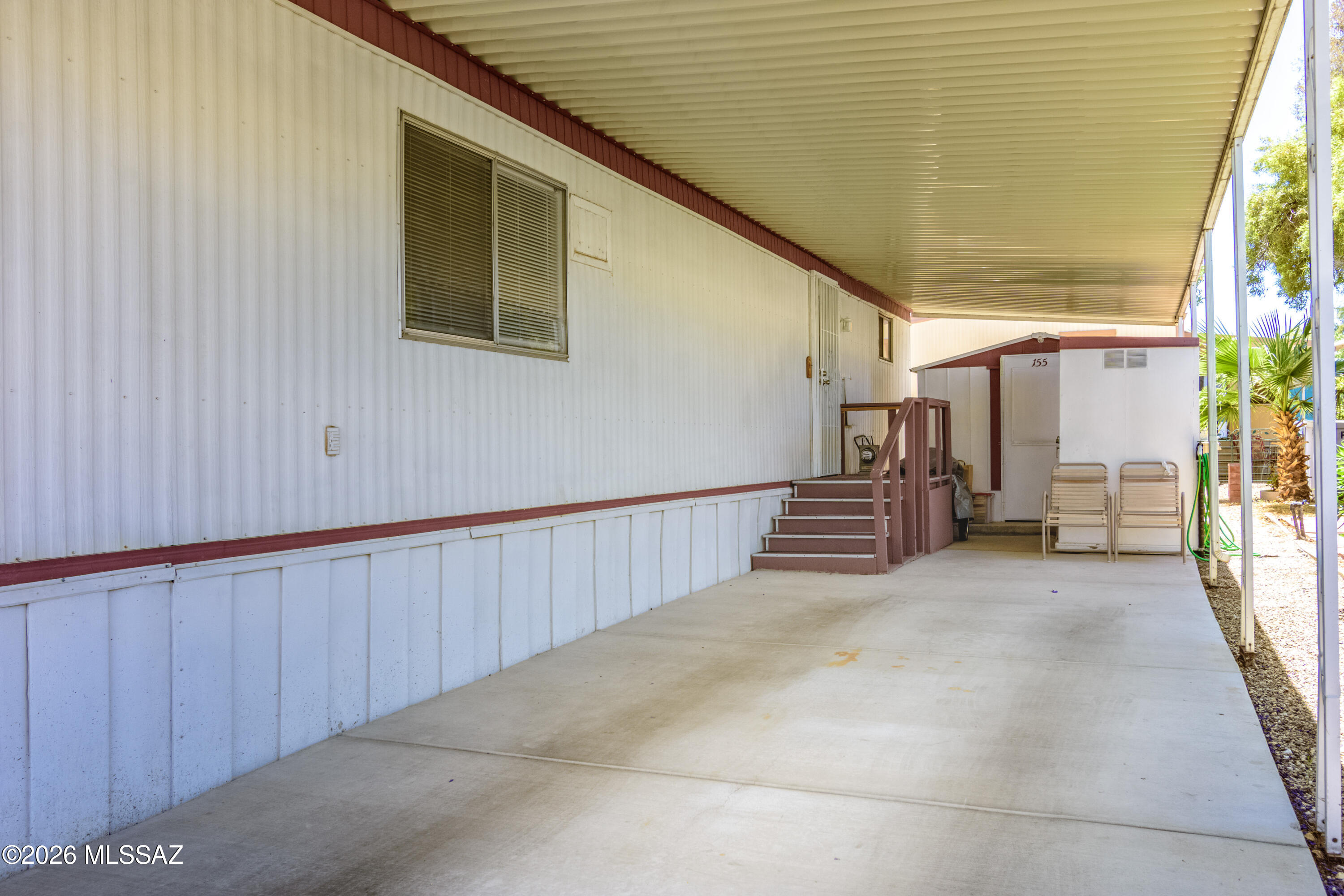 4550 North Flowing Wells Road, Unit 155 Tucson, AZ 85705 - Photo 4 of 40 a view of a porch