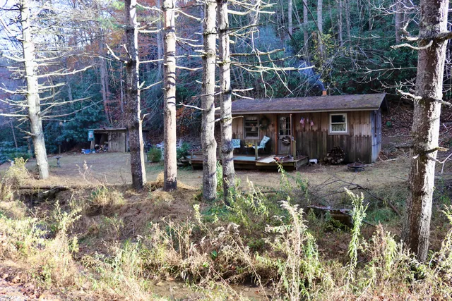 a view of a building with sitting area