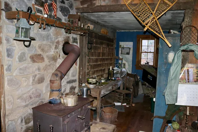 a view of living room kitchen and entryway
