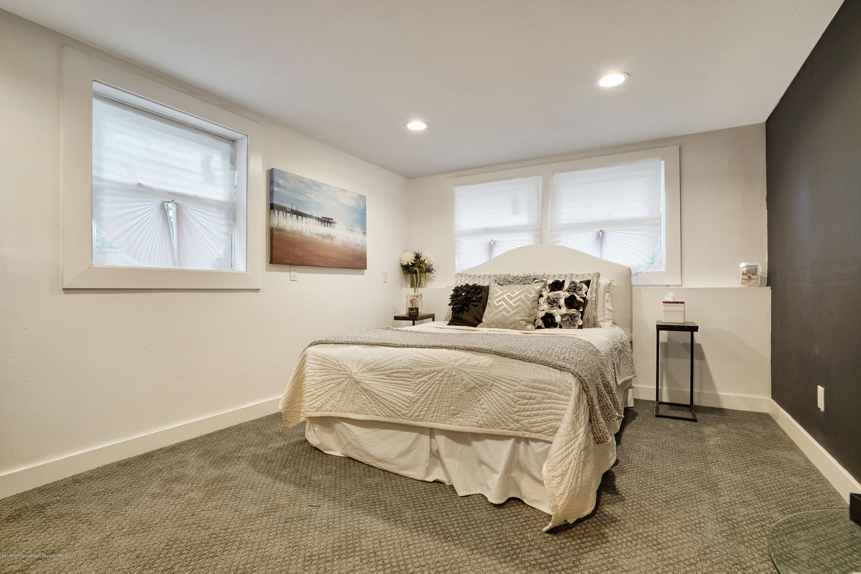 5 Ash Street Eatontown, NJ 07724 - Photo 15 of 31 a bedroom with a bed and a painting