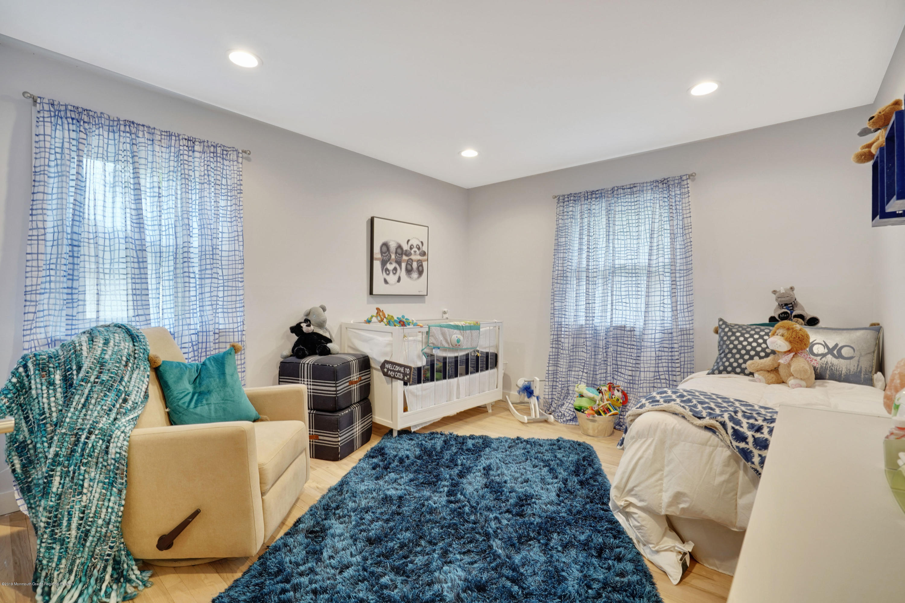 5 Ash Street Eatontown, NJ 07724 - Photo 19 of 31 a bedroom with furniture and a large window