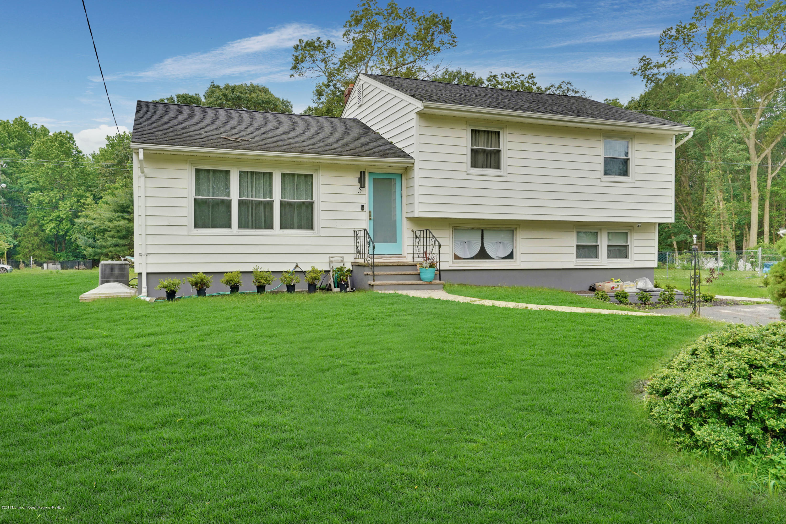 5 Ash Street Eatontown, NJ 07724 - Photo 21 of 31 a front view of house with yard